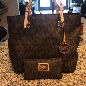 Michael Kors bag with matching wallet.